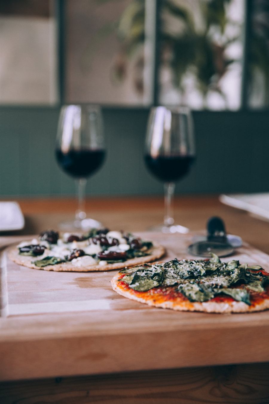 Wood oven garlic flatbreads on a serving board